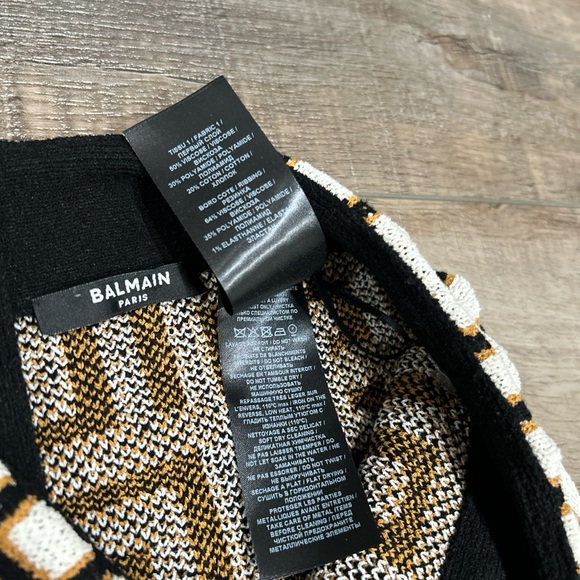 Balmain wrap effect fringed monogram knit logo mini skirt in noir and naturel - Picture 5 of 9